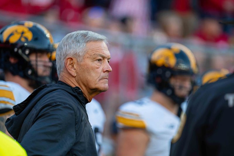 Oct 11, 2025; Madison, Wisconsin, USA; Iowa Hawkeyes head coach Kirk Ferentz eyes the field before a game against the Wisconsin Badgers at Camp Randall Stadium. Mandatory Credit: Ross Harried-Imagn Images
