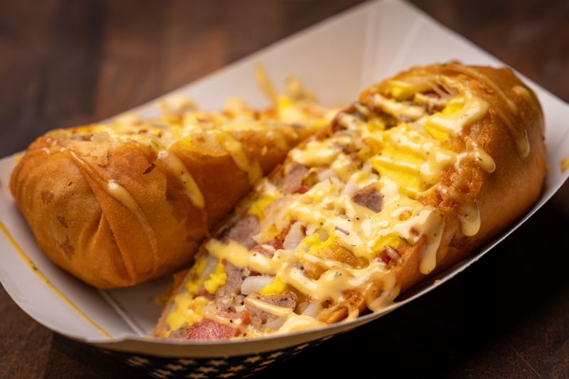 The All-American Scrambled Egg Roll from Winn & Sara's Kitchen is photographed during the Best New Fair Foods of 2026 contest at the Iowa State Fair on Tuesday, July 14, 2026. The item is one of the Iowa State Fair's top 11 new foods for 2026.