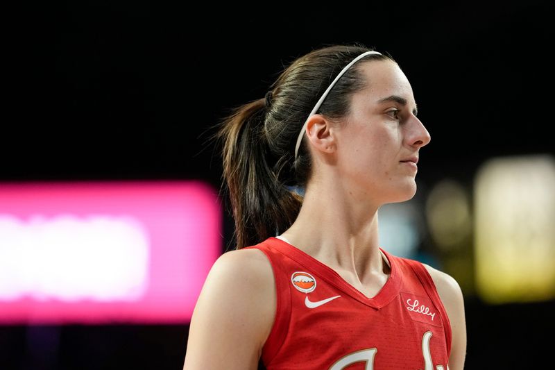 Jul 12, 2026; Las Vegas, Nevada, USA; Indiana Fever guard Caitlin Clark (22) looks on during the third quarter of a WNBA basketball game against the Las Vegas Aces at Michelob Ultra Arena. Mandatory Credit: Lucas Peltier-Imagn Images