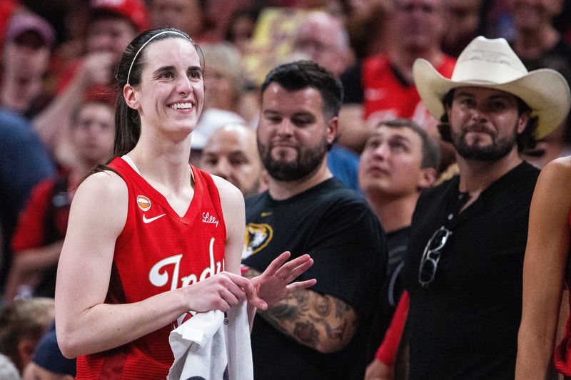 Jul 17, 2026; Indianapolis, Indiana, USA; Indiana Fever guard Caitlin Clark (22) looks on in the second half against the Seattle Storm at Gainbridge Fieldhouse. Mandatory Credit: Trevor Ruszkowski-Imagn Images