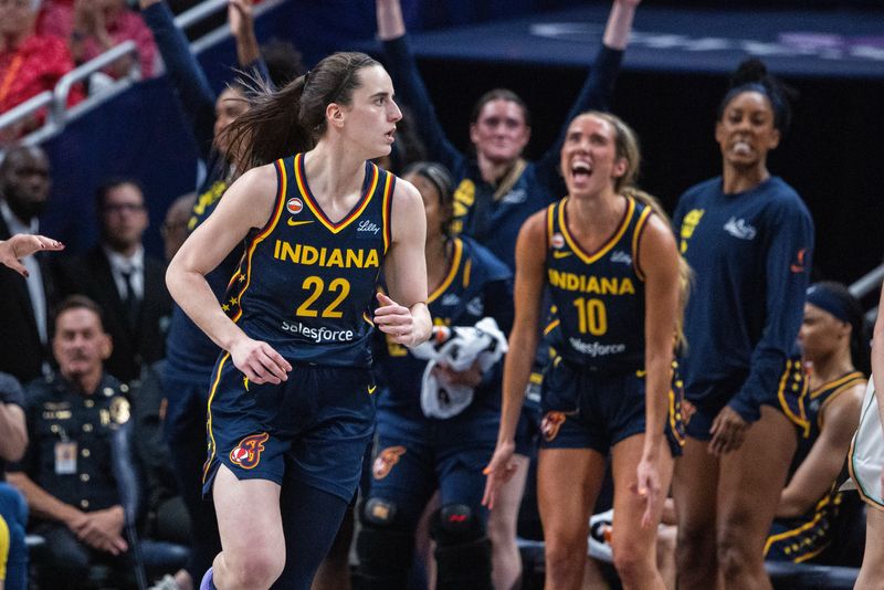 Jul 18, 2026; Indianapolis, Indiana, USA; Indiana Fever guard Caitlin Clark (22) celebrates a made basket in the second half against the New York Liberty at Gainbridge Fieldhouse. Mandatory Credit: Trevor Ruszkowski-Imagn Images