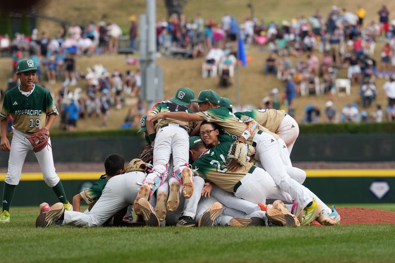Aug 24, 2025; Williamsport, PA, USA; Asia-Pacific Region react after winning the game against Mountain Region at Howard J. Lamade Stadium. Mandatory Credit: Kyle Ross-Imagn Images