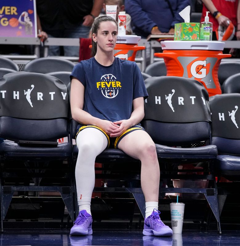 Indiana Fever guard Caitlin Clark (22) sits Wednesday, July 22, 2026, before a game at Gainbridge Fieldhouse in Indianapolis.