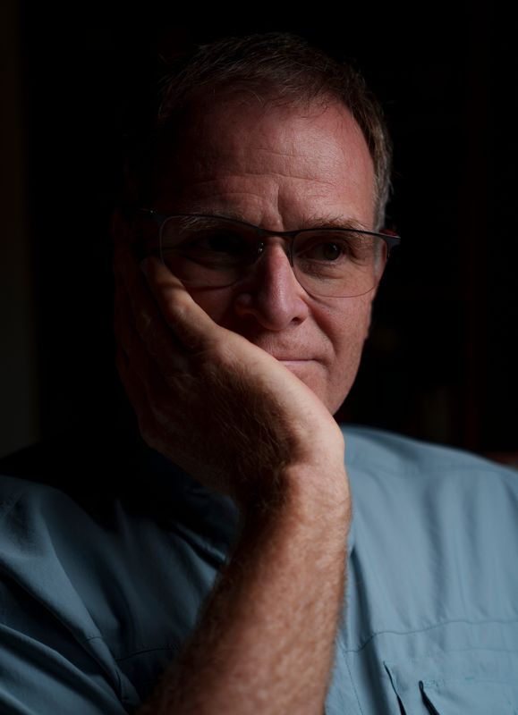 Rusty Martin sits for a portrait and has made the choice to go to Switzerland for doctor assisted suicide Friday, July 17, 2026 in Des Moines. He has stage 5 Alzheimer's disease and with the support of his wife is going through the process to get medical services that are not available to him in Iowa. These include mental assessments to determine if he is of sound mind to make these decisions.