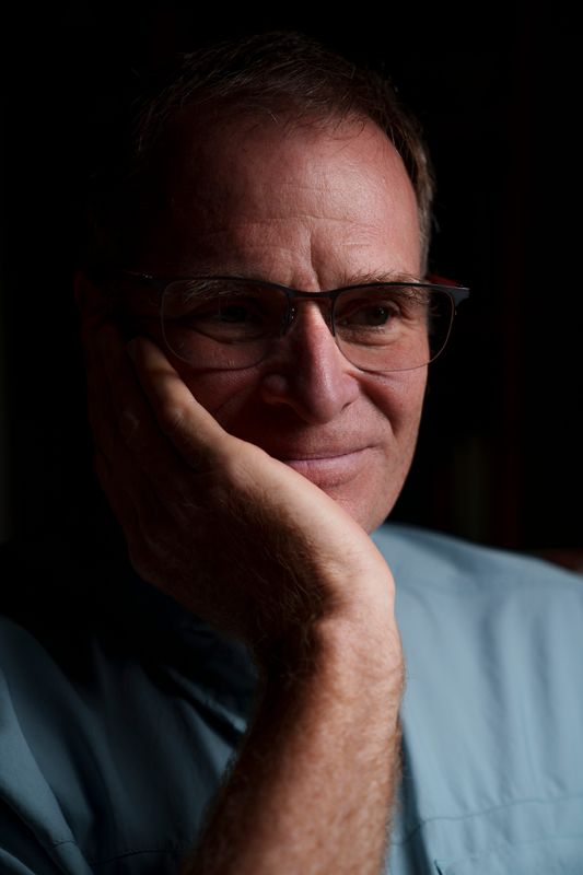 Rusty Martin sits for a portrait and has made the choice to go to Switzerland for doctor assisted suicide Friday, July 17, 2026 in Des Moines. He has stage 5 Alzheimer's disease and with the support of his wife is going through the process to get medical services that are not available to him in Iowa. These include mental assessments to determine if he is of sound mind to make these decisions.
