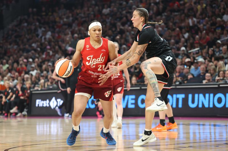 Jul 31, 2026; Portland, Oregon, USA;  Indiana Fever forward Makayla Timpson (21) drives to the basket against Portland Fire forward Emily Engstler (21) during the first half at Moda Center. Mandatory Credit: Jaime Valdez-Imagn Images