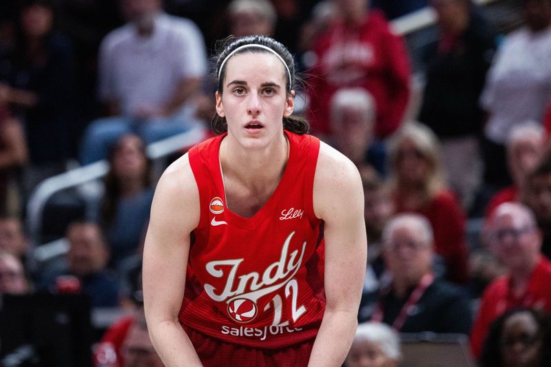 Aug 6, 2026; Indianapolis, Indiana, USA; Indiana Fever guard Caitlin Clark (22) looks on in the second half of a game against the Las Vegas Aces at Gainbridge Fieldhouse. Mandatory Credit: Trevor Ruszkowski-Imagn Images