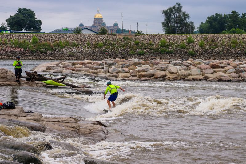 Officials from Denver-based Merrick Whitewater test out the whitewater recreation feature at the Principal Point location in downtown Des Moines along the Iowa Confluence Water Trails (ICON) on Thursday, Aug. 6, 2026.