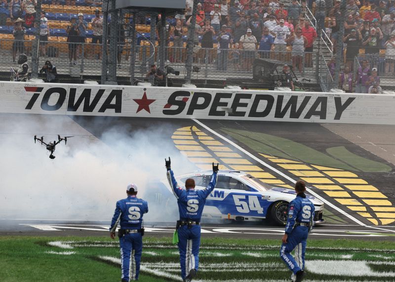 Ty Gibbs burns out his tires at the start-finish line after winning the Iowa Corn 350, his second career NASCAR Cup Series win.