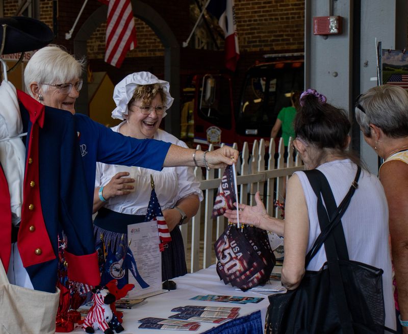 Staff members dressed up in historical outfits will be at the Spirit of 1776 fair exhibit at the 2026 Iowa State Fair.