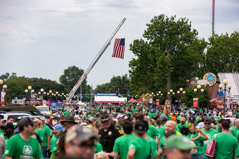 Fairgoers attend the first day of the Iowa State Fair on Aug. 13, 2026, in Des Moines.