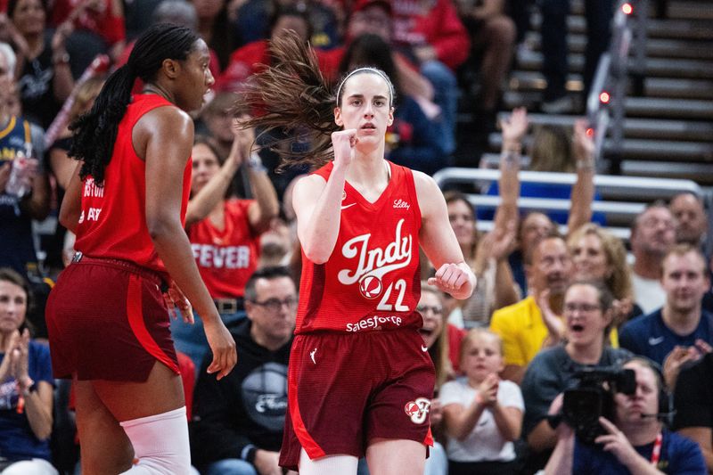 Aug 14, 2026; Indianapolis, Indiana, USA;  Indiana Fever guard Caitlin Clark (22) celebrates a made basket in the second half against the Dallas Wings at Gainbridge Fieldhouse. Mandatory Credit: Trevor Ruszkowski-Imagn Images