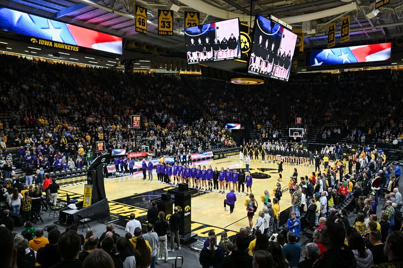 Dec 20, 2024; Iowa City, Iowa, USA; A general view of Carver-Hawkeye Arena during the national anthem before the game between the Iowa Hawkeyes and the Northern Iowa Panthers. Mandatory Credit: Jeffrey Becker-Imagn Images