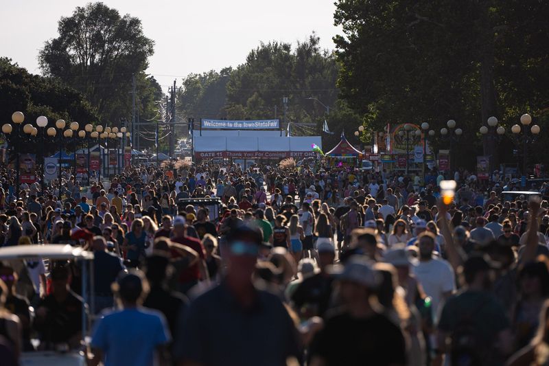 Fairgoers walk the grand concourse at the Iowa State Fair on Aug. 17, 2026, in Des Moines.