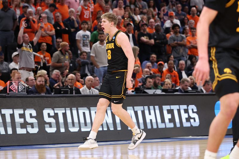 Mar 28, 2026; Houston, TX, USA; Iowa Hawkeyes forward Cooper Koch (8) reacts in the second half against the Illinois Fighting Illini during an Elite Eight game of the South Regional of the men's 2026 NCAA Tournament at Toyota Center. Mandatory Credit: Troy Taormina-Imagn Images