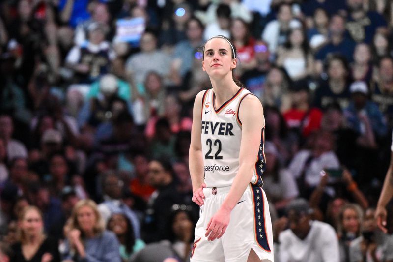 Aug 22, 2026; Brooklyn, New York, USA;  Indiana Fever guard Caitlin Clark (22) reacts during the second half against the New York Liberty at Barclays Center.  Mandatory Credit: John Jones-Imagn Images