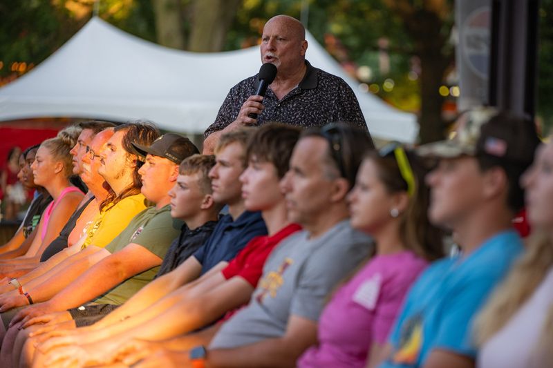 Hypnotist Ron Diamond performs with audience volunteers at the Iowa State Fair on Aug. 22, 2026.