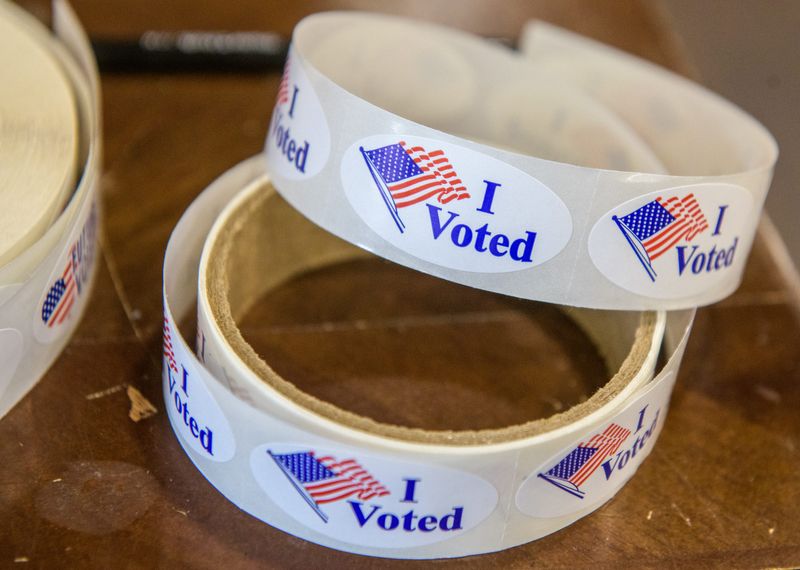 A roll of "I Voted" stickers lies on a table at the Cedar Hills Baptist Church polling place Tuesday, April 4, 2023 in Dunlap.