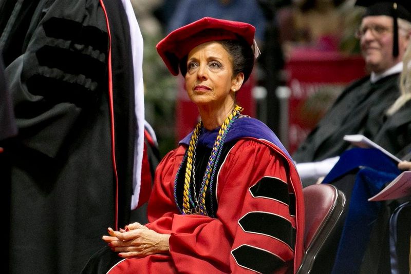 In this 2014 file photo, Bradley University President Joanne Glasser listens to commencement speakers at a graduation ceremony held at Peoria Civic Center.