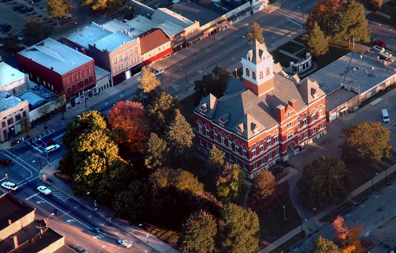 Here is an aerial view of downtown Oregon, with the Ogle County Courthouse dominating the public square; at the main intersection (lower left) Route 2 intersects Route 64. The courthouse is on the National Register of Historic Places.