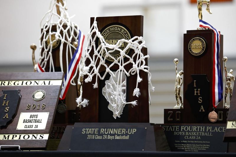 If there are trophies like these awarded to the state's top basketball teams this school year, they likely won't be presented at the IHSA's new boys basketball venue, the State Farm Center at the U of I. [SUSAN MORAN/RRSTAR.COM & THE JOURNAL-STANDARD CORRESPONDENT