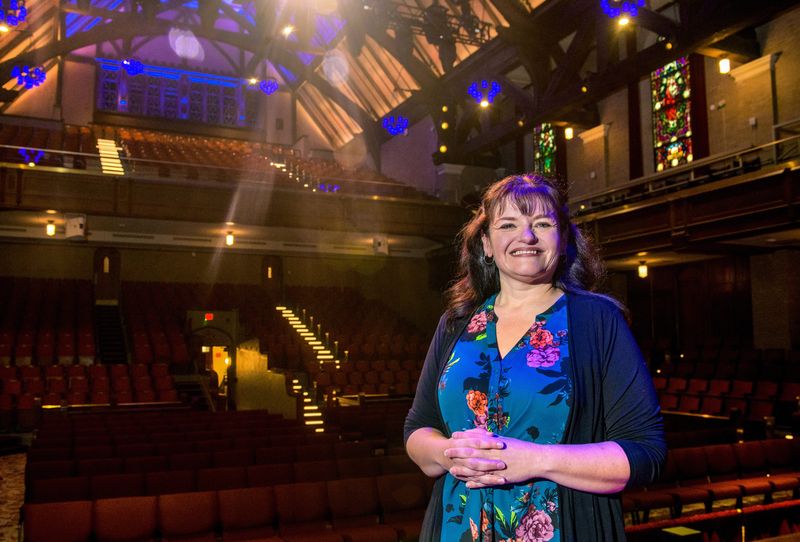 Founder and owner Kindall Reuschel stands in one of the many music venues she covers, the Scottish Rite Cathedral, for her online venture Peoria Music Live. Reuschel has been running the organization, a resource for live music throughout the Peoria area, since 2017. Peoriamusiclive.com features stories and photos about local artists and venues and the Facebook page carries a gallery of live-streamed performances.