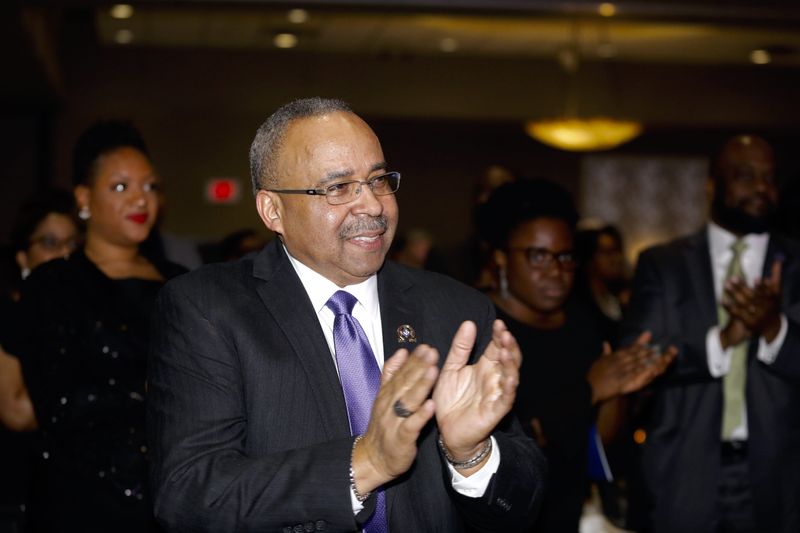 Dr. Cyrus Oates applauds during the Rockford Association for Minority Management´s 38th annual Scholars Banquet Friday, Feb. 22, 2019, at Giovanni´s Restaurant & Convention Center in Rockford. Oates is a finalist for the 2025 Excalibur award.