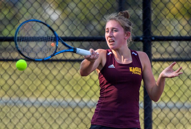 Dunlap's Alassea Michel returns a shot to Morton's Halle Stevens during their tennis match Tuesday, Sept. 19, 2023 at Dunlap High School.
