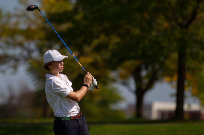 Boylan's Cole Beto watches his tee shot on Friday, Sept. 22, 2023, at Aldeen Golf club in Rockford.