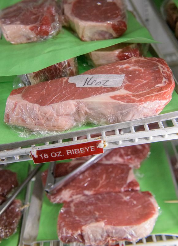 Customers have a variety of different cuts of steak to choose from in Alexander's Steakhouse's refrigerators.
