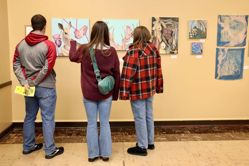 Visitors view art Saturday, Oct. 7, 2023, during fall ArtScene at Rockford United Labor in downtown Rockford.