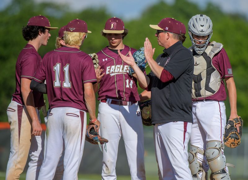 Dunlap head coach Eric Stone tries to rally his players as they battle Joliet Catholic during their Class 3A baseball sectional semifinal game Wednesday, May 29, 2024 in Washington. The Eagles fell 3-1.