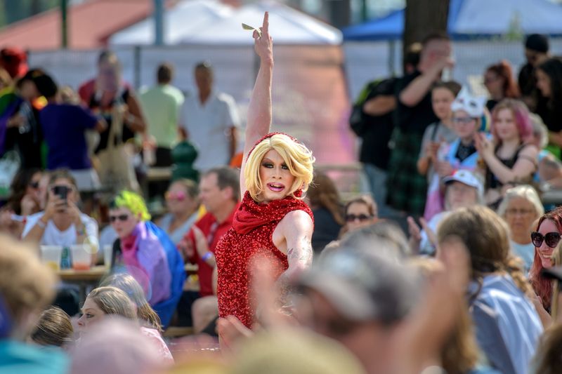 Chicago-based performer Priscilla Rock strikes a pose for the finale of her drag show during the River City Pride Festival on Saturday, July 20, 2024 on the Peoria riverfront.