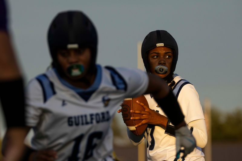 Guilford's Aishah Smith (33) looks to pass the ball during a game against Hononegah on Sep. 19, 2024, at Hononegah High School in Rockton.