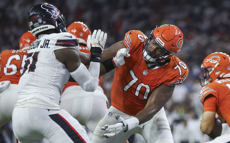 Sep 15, 2024; Houston, Texas, USA; Chicago Bears offensive tackle Braxton Jones (70) defends against Houston Texans defensive end Will Anderson Jr. (51) during the game at NRG Stadium. Mandatory Credit: Troy Taormina-Imagn Images