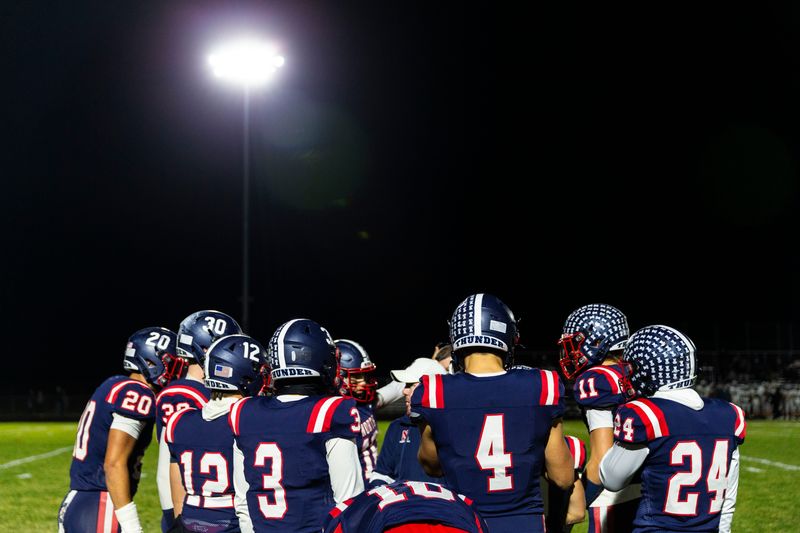 Belvidere North huddles up before a playoffs game against Kaneland on Nov. 1, 2024 at Belvidere North High School.