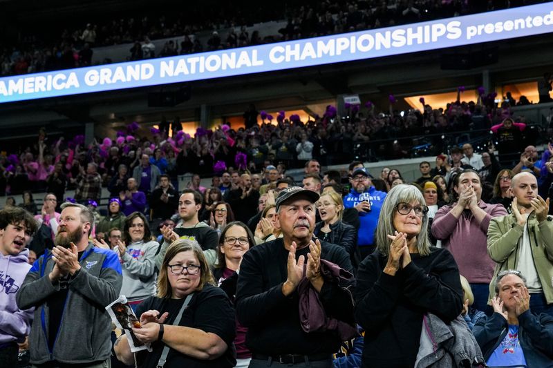 Fans cheer as the American Fork Marching Band of Utah performs Saturday, Nov. 16, 2024, during the 2024 Bands of America Grand National Championship at Lucas Oil Stadium in Indianapolis.