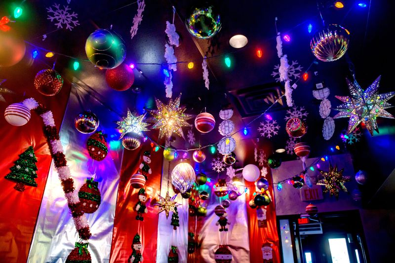 Dozens of Christmas ornaments hang from the ceiling at Jalapenos Mexican restaurant in 2024. The Metro Centre restaurant is once again decked out in Christmas decorations.