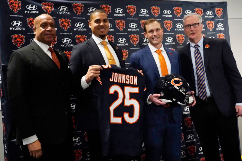 Jan 22, 2025; Lake Forest, IL, USA; Chicago Bears (R-L) President Kevin Warren, general manager Ryan Poles, new head coach Ben Johnson and chairman George McCaskey pose for photos after a press conference introducing Johnson at PNC Center. Mandatory Credit: David Banks-Imagn Images
