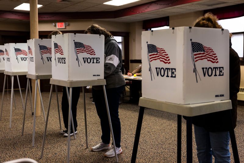 Voters fill out their ballots at voting booths on Tuesday, April 1, 2025, at Salem Lutheran Church in Rockford.