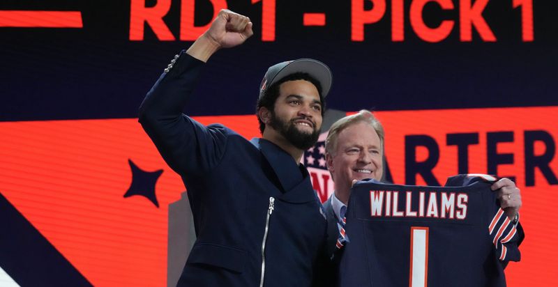 Apr 25, 2024; Detroit, MI, USA; Southern California Trojans quarterback Caleb Williams poses with NFL commissioner Roger Goodell after being selected by the Chicago Bears as the No. 1 pick in the first round of the 2024 NFL Draft at Campus Martius Park and Hart Plaza. Mandatory Credit: Kirby Lee-USA TODAY Sports
