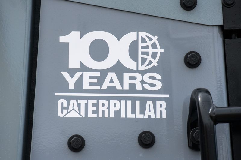 A 100th anniversary logo adorns the side of a limited-edition gray Caterpillar D8 tractor at Building SS in East Peoria.
