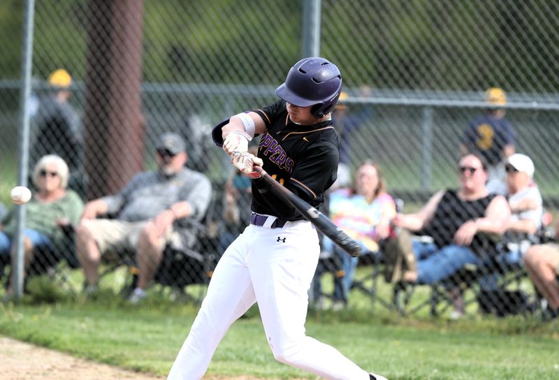 Mount Pulaski's Chance Payne barrels up a home run against Southeast during a nonconference baseball game at Eisenhower Park on Friday, April 25, 2025. Mount Pulaski won 9-1.