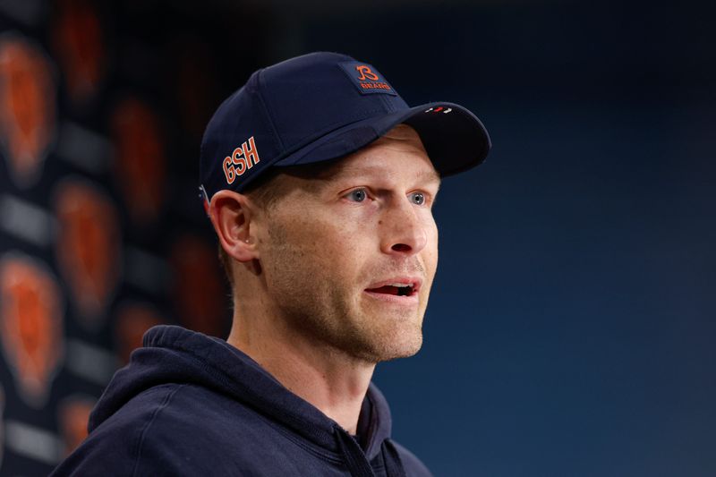 May 9, 2025; Lake Forest, IL, USA; Chicago Bears head coach Ben Johnson (R) speaks during the Rookie Minicamp at Halas Hall. Mandatory Credit: Kamil Krzaczynski-Imagn Images