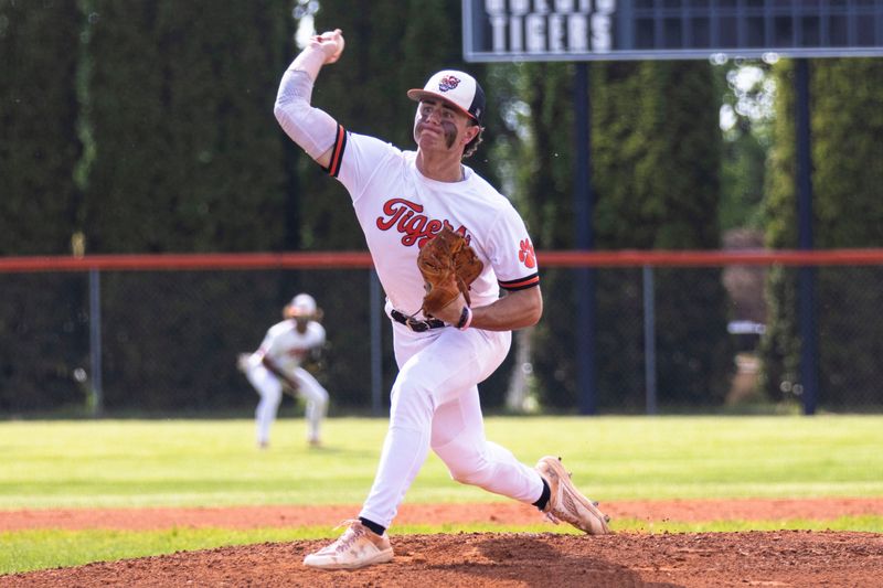 Byron pitcher Andrew Talbert (27) pitches the ball against North Boone on Tuesday, May 13, 2025, at Byron High School.