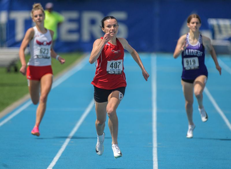 Henry-Senachwine’s Daniella Bumber (407) sprints to a third-place finish in the Class 1A state 400-meter dash Saturday, May 24, 2025 at Eastern Illinois University in Charleston.