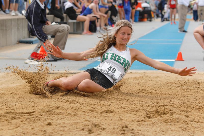Athens' Ava Bee successfully lands in the sand in the Class 1A long jump at the girls track and field state finals at Eastern Illinois University's O'Brien Field on Saturday, May 24, 2025. Bee finished third in the event.