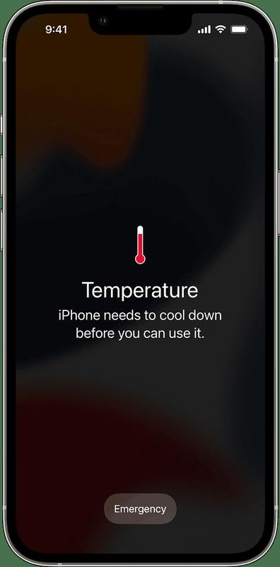 An iPhone 13 Pro displays a temperature warning.