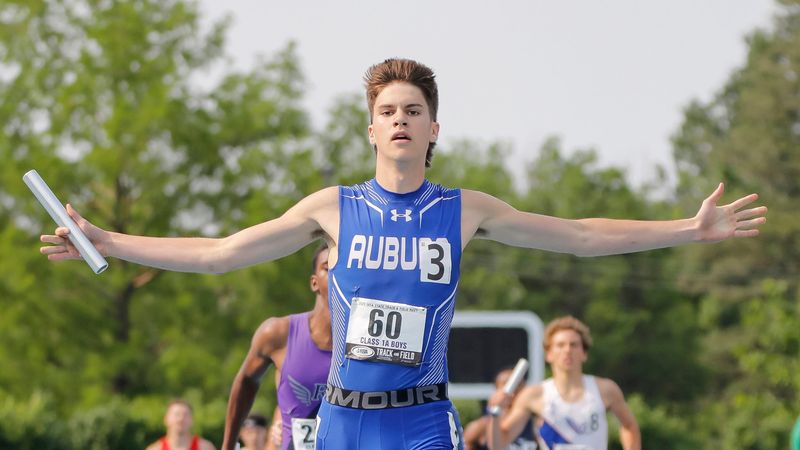 Auburn junior Jacob Barth celebrates his win of the Class 1A 4x400-meter relay of the boys track and field state finals at Eastern Illinois University's O'Brien Field on Saturday, May 31, 2025.