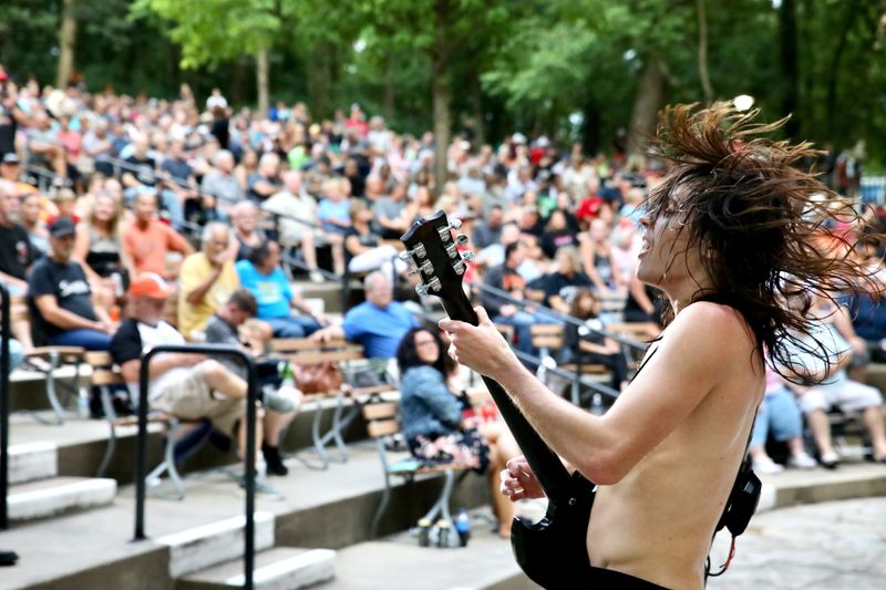Thunderstruck AC/DC cover band performs as part of the Rockford Park District’s Sounds of Summer music series Thursday, July 13, 2023, at the Sinnissippi Park Music Shell in Rockford.
